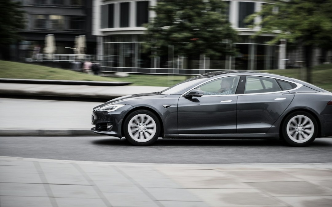 panning photography of sedan