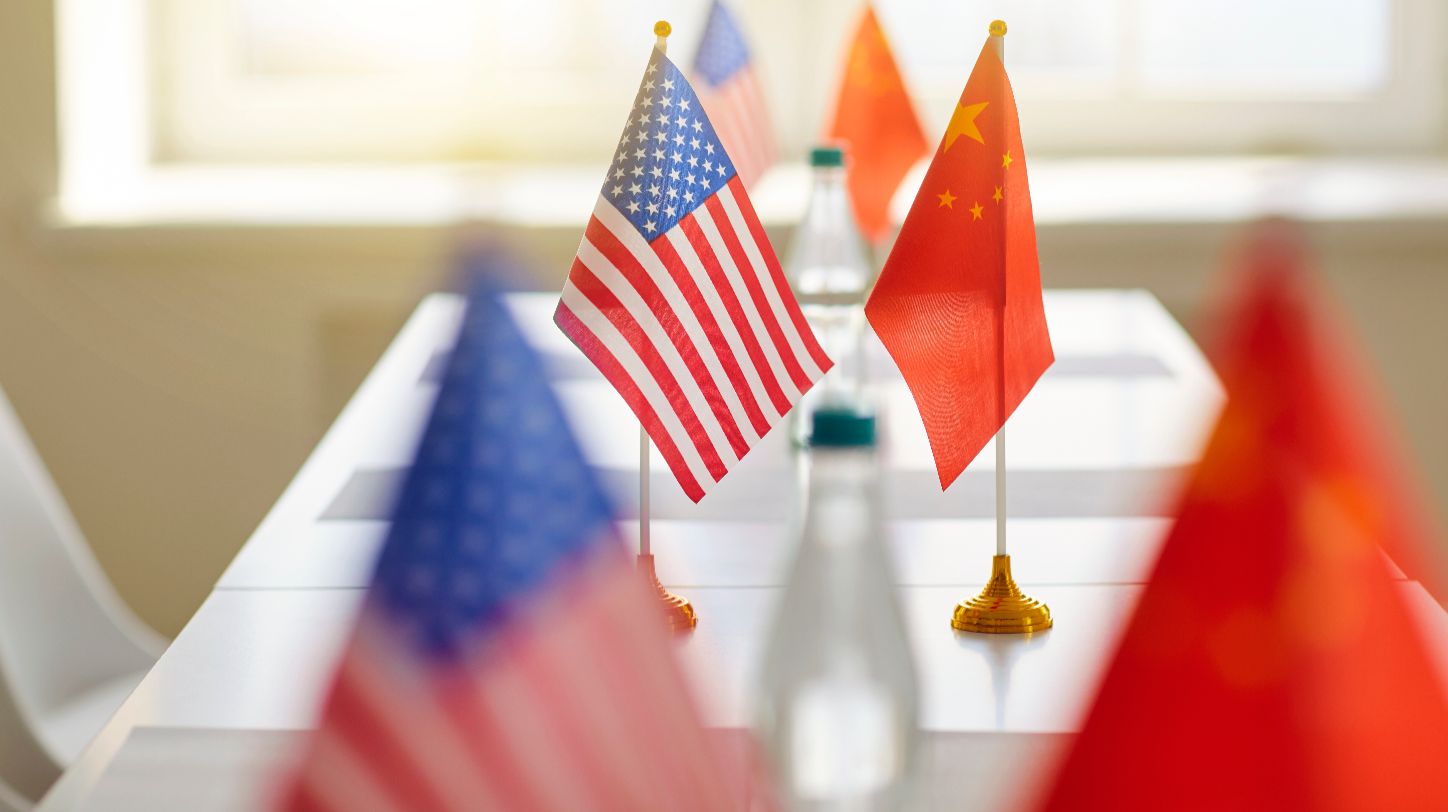 Table with flags and water bottle
